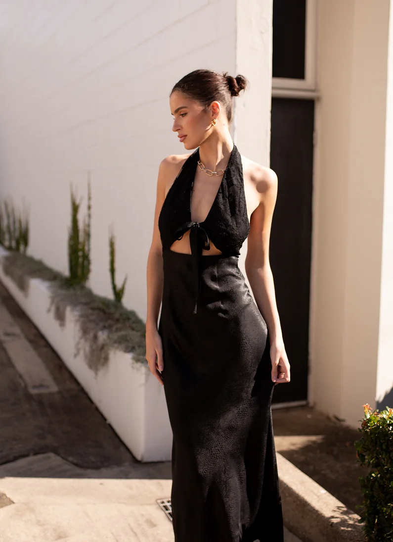 Black silk halter neck evening dress with lace detail, manufactured by Passionworks