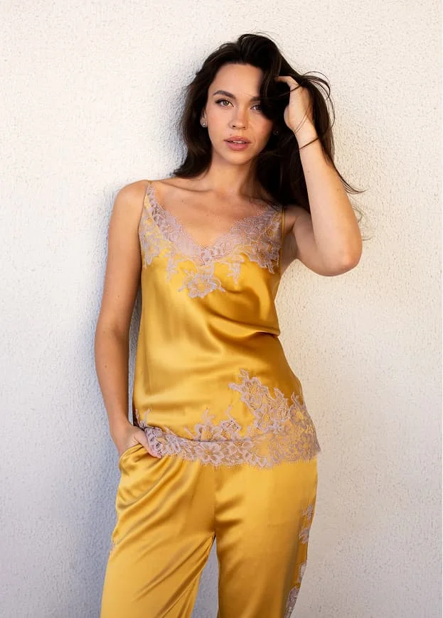 Gold silk camisole and trouser set featuring intricate lace trim production sample.