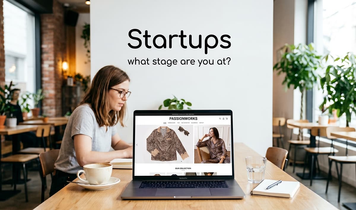 Fashion startup founder researching garment manufacturing on laptop with Passionworks website in a cafe setting